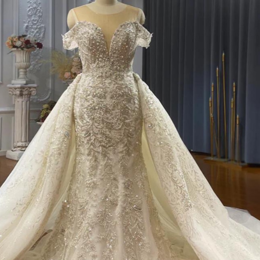 Elegant Ivory Beaded Off-Shoulder Wedding Dress